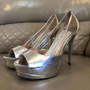 Bebe sliver and clear high heels